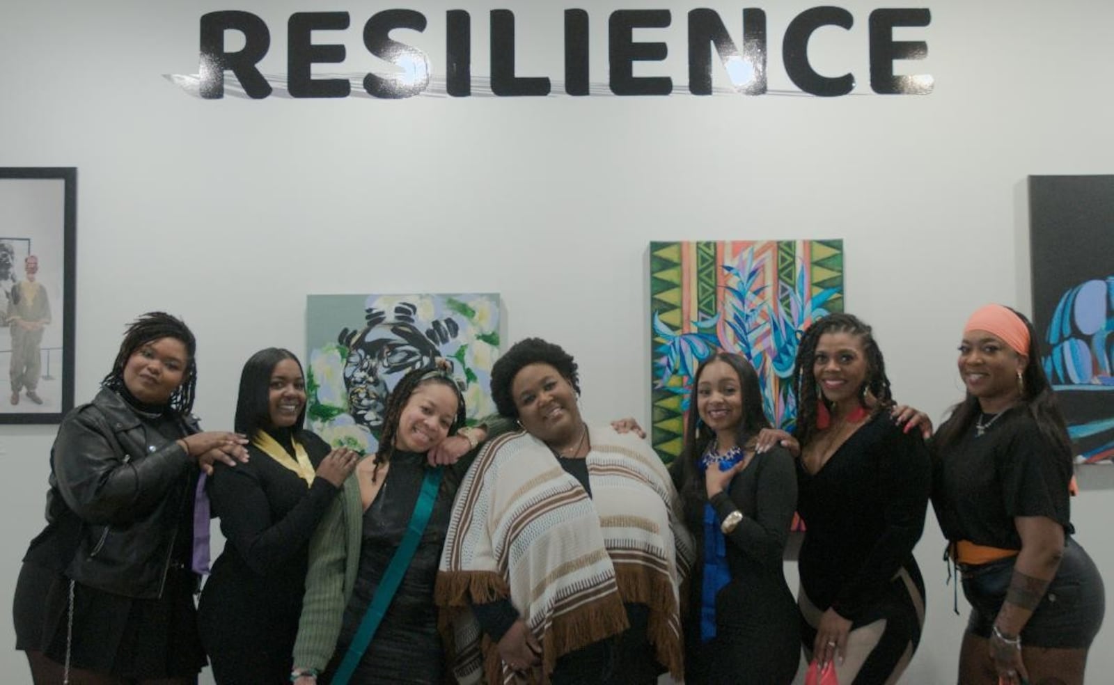 Left to right: Charlize Perry (Lady in Purple), Myca Poynter (Lady in Yellow), Vanae Iesha (Lady in Green), Roniece Hutchins (Lady in Brown), Ronda Ogletree (Lady in Blue), El More (Lady in Red) and Samantha Reneé (Lady in Orange) comprise the cast of INNOVAtheatre's production of "For Colored Girls" at the Edward A. Dixon Gallery. CONTRIBUTED