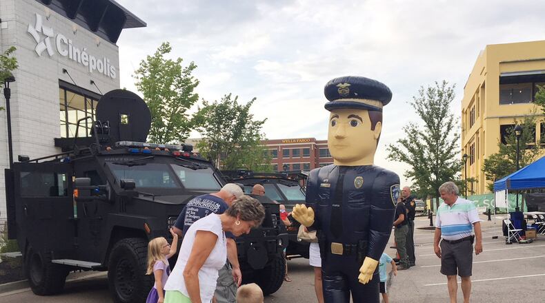 Miami Twp.’s Police Department in recent years has held a National Night Out event at Austin Landing. STAFF