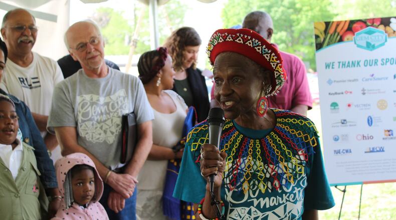 Mama Nozipo Glenn talks about a lack of access to healthy and fresh foods in northwest Dayton during Wednesday’s unveiling of the home of the Gem City Market food co-op. CORNELIUS FROLIK / STAFF