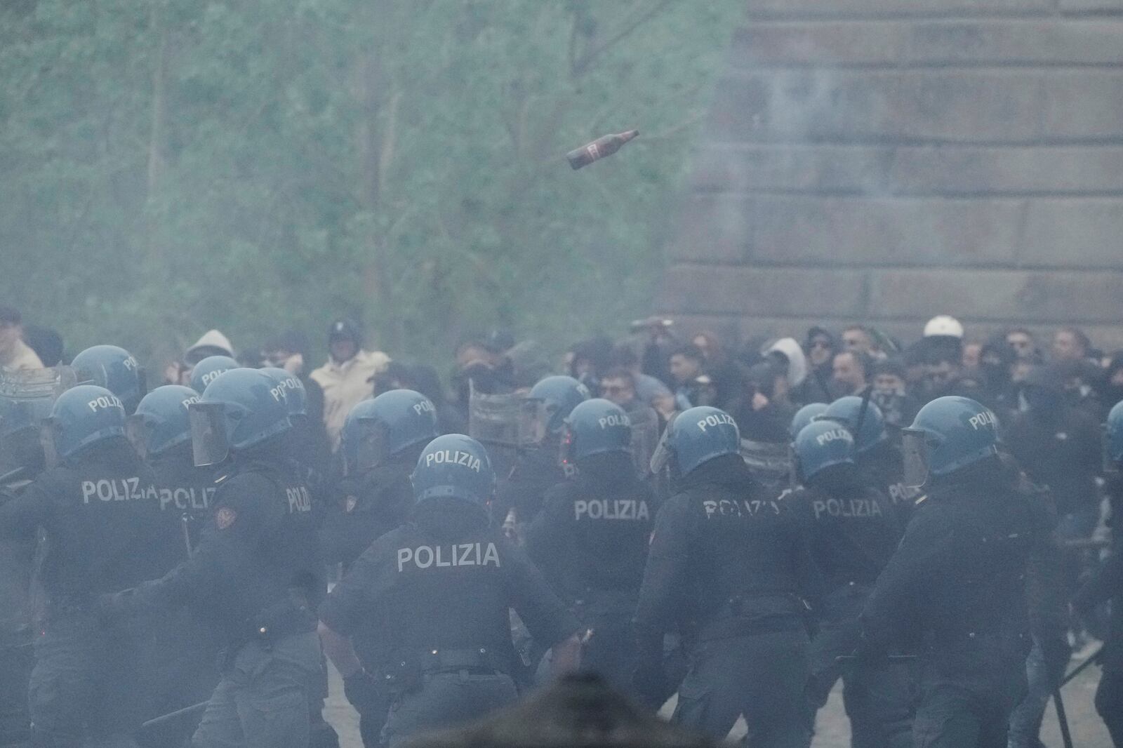 Lazio fans riot with police ahead of the Italian Serie A soccer match between Lazio and Roma at Rome's Olympic stadium, Sunday, April 13, 2025. (AP Photo/Gregorio Borgia)