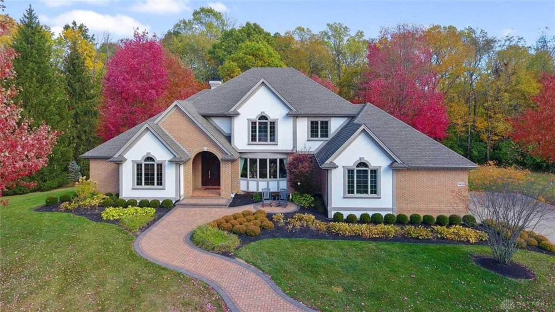 French country-style home offers grand social areas