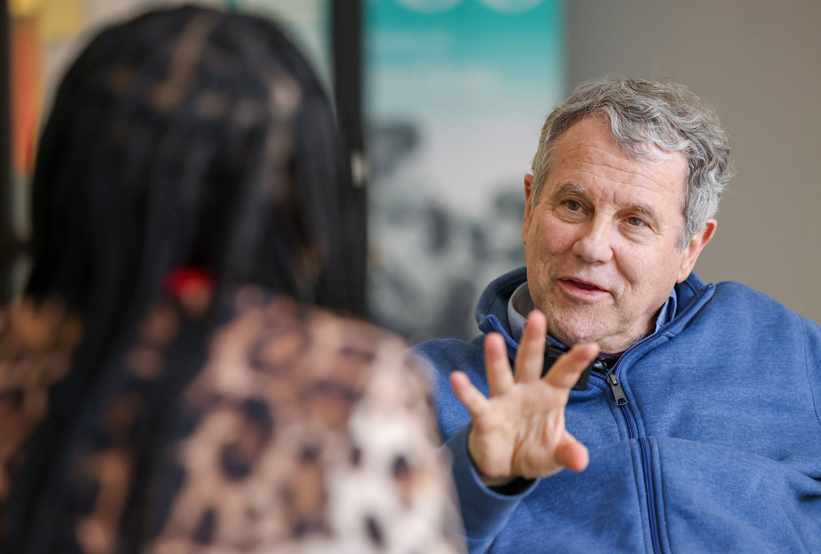 Former Sen. Sherrod Brown listens to Dabriah Rice, left, after a tour of 6888 Kitchen Incubator in the Dayton Arcade on Wednesday, Feb. 11.  BRYANT BILLING / STAFF