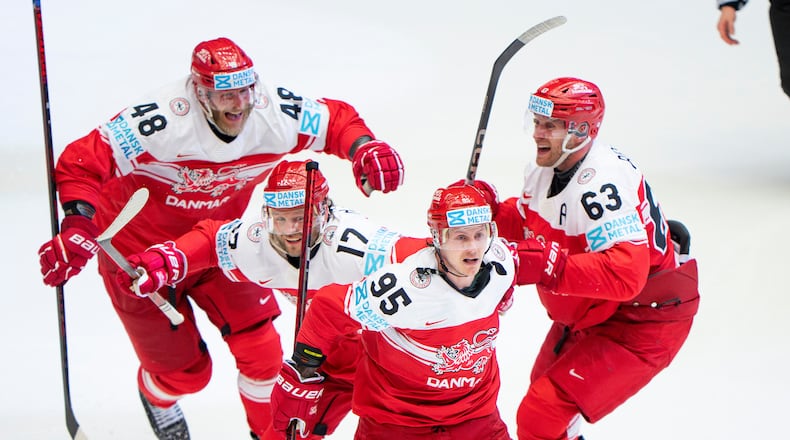 FILE - Denmark's Nick Olesen (95) celebrates with teammates after scoring the winning goal in a quarterfinal game between Canada and Denmark at the hockey world championships, May 22, 2025, in Herning, Denmark. (Bo Amstrup/Ritzau Scanpix via AP, File)