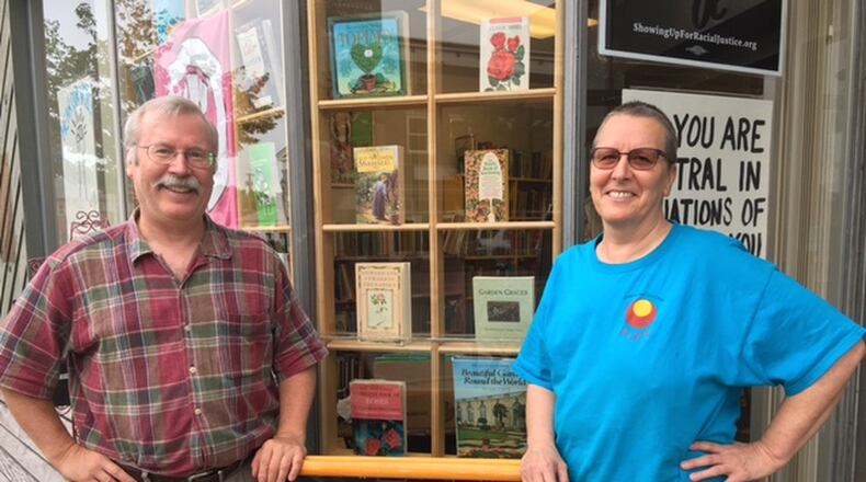 Lawrence Hammar and Cassandra Lee at their bookstore, Blue Jacket Books, in Xenia.