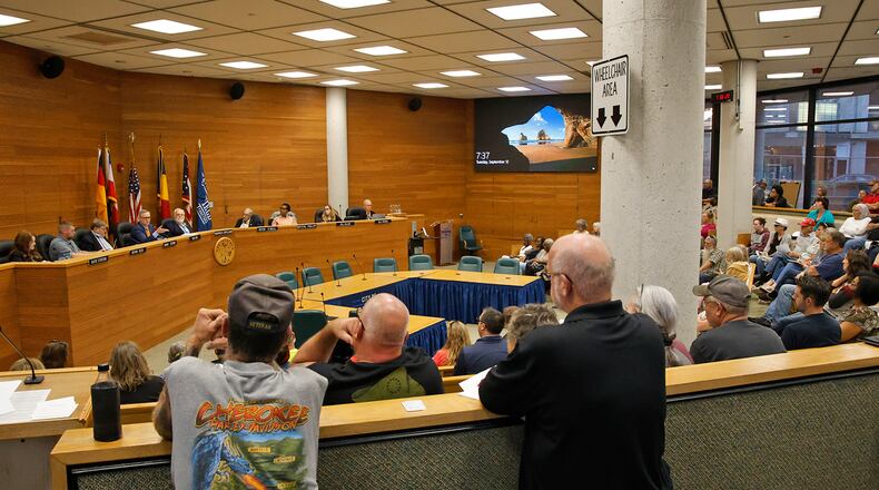 A crowded Springfield City Commission meeting Tuesday, Sept. 12, 2023, shown here, was followed by a similar meeting Tuesday, Sept. 26. BILL LACKEY/STAFF