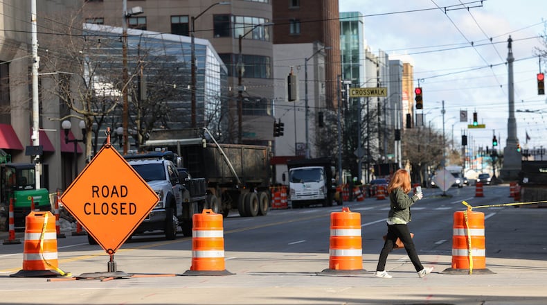 Main Street between East Second Street and East Third Street remains closed on Monday due to part of the northeast corner for the former Key Bank building collapsing into an alley below Stratacache Tower. Some debris also struck Stratacache Tower on Saturday. BRYANT BILLING / STAFF