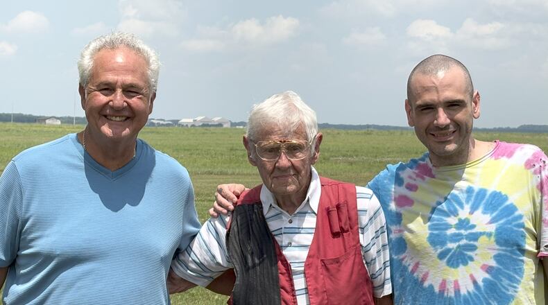 Benny Dixon is flanked by his son Terry (left) and grandson Morgan (right) at the Base Rod & Gun Club. TOM ARCHDEACON/CONTRIBUTED PHOTO