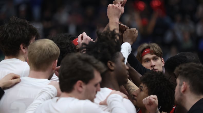 Dayton huddles during a game against Arizona in the second round of the NCAA tournament on Saturday, March 23, 2024, at the Delta Center in Salt Lake City, Utah. David Jablonski/Staff