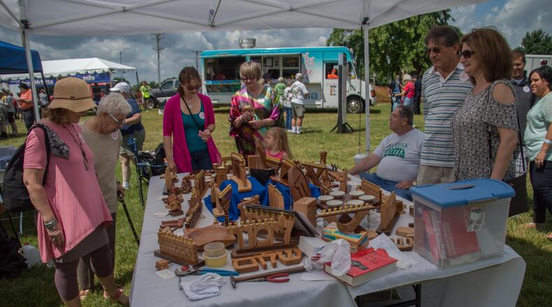 Members and non-members of the Dayton Jewish community celebrated an afternoon of traditions, faith, food, drinks and entertainment at Temple Israel, 130 Riverside Drive, Dayton, on Sunday, June 5. (TOM GILLIAM/CONTRIBUTED)