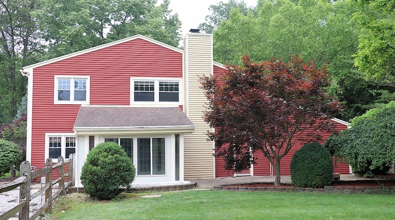 Listed for $329,900, the vinyl-sided, two-story home at 811 Hickory Hollow offers about 2,072 square feet of living space. Contributed photos by Kathy Tyler
