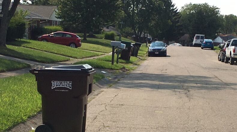 A proposal in Miami Twp. would restrict the time that garbage containers could be on the curbs of properties. NICK BLIZZARD/STAFF