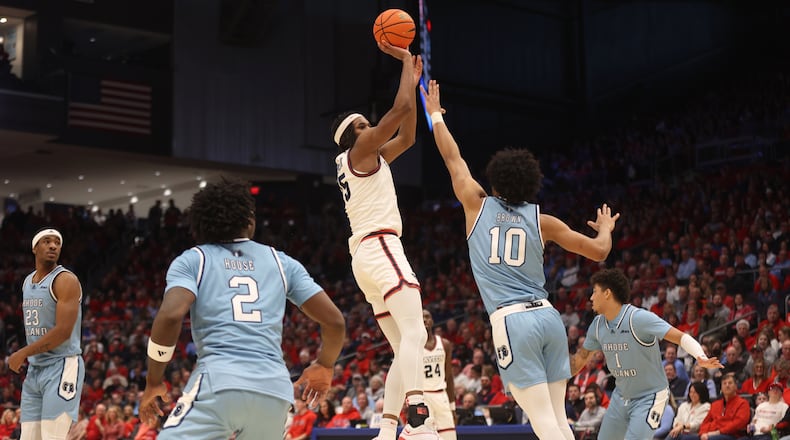 Dayton's DaRon Holmes II shoots against Rhode Island on Saturday, Jan. 20, 2024, at UD Arena. David Jablonski/Staff