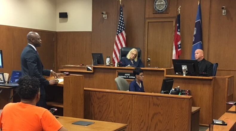 Miamisburg Police Officer Russell Green testified Friday in the case of Charles Ashford. The Dayton man is facing multiple charges stemming from an armed robbery Feb. 5 at gas station near the Ohio 725 and Interstate 75 interchange. Ashford was wounded by police, who said he tried to flee the scene by carjacking vehicles. NICK BLIZZARD/STAFF