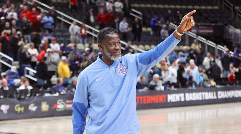 Dayton's Anthony Grant leaves the court after a victory against Saint Louis in the semifinals of the Atlantic 10 Conference tournament on Saturday, March 14, 2026, at PPG Paints Arena in Pittsburgh. David Jablonski/Staff