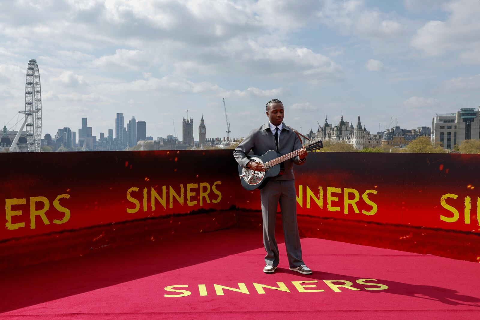 Miles Caton poses for photographers during the photo call for the film 'Sinners' on Sunday, April 13, 2025, in London. (Photo by Millie Turner/Invision/AP)