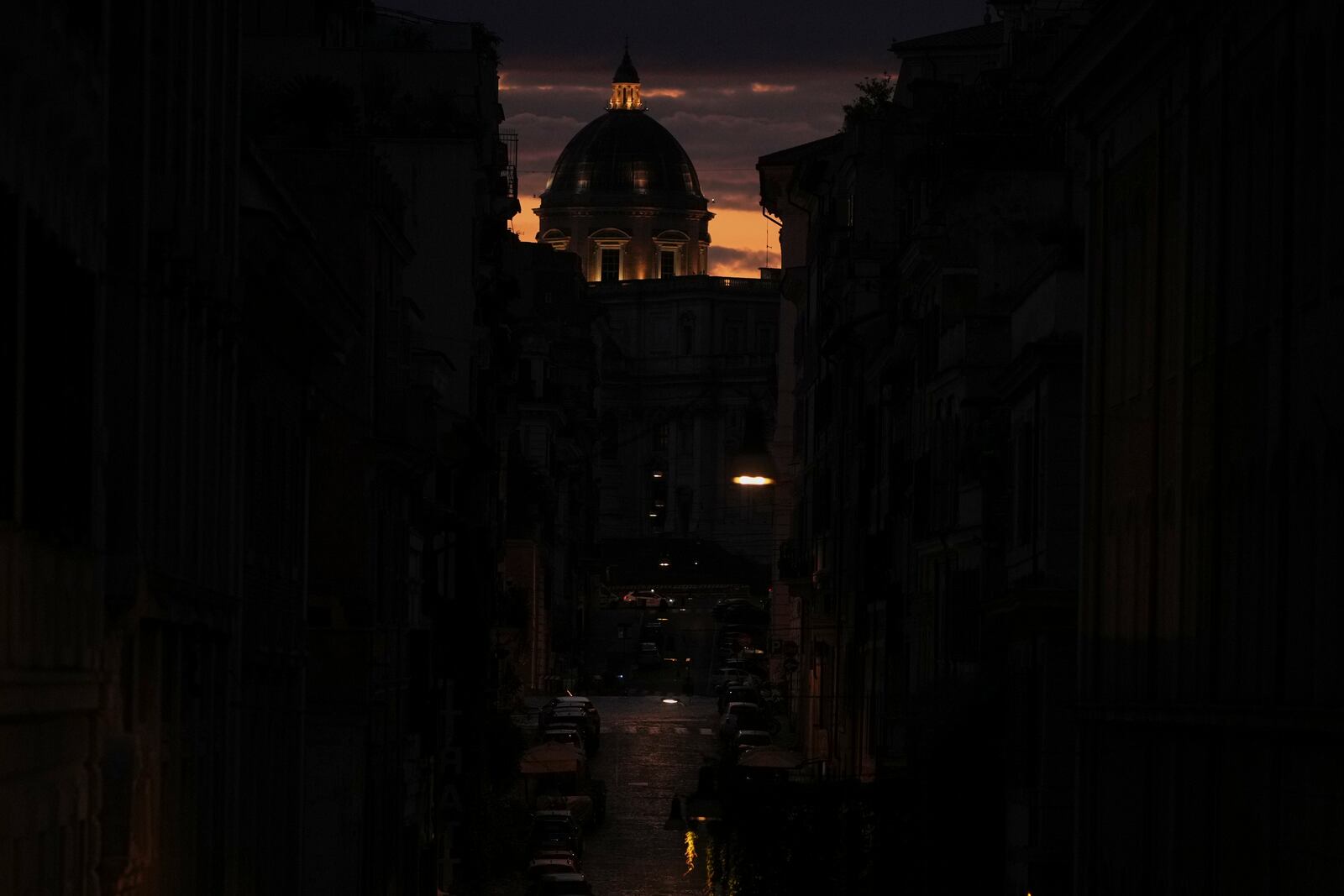 The sun begins to rise behind St. Mary Major Basilica, a day after Pope Francis was buried at the basilica in Rome, Sunday, April 27, 2025. (AP Photo/Alessandra Tarantino)