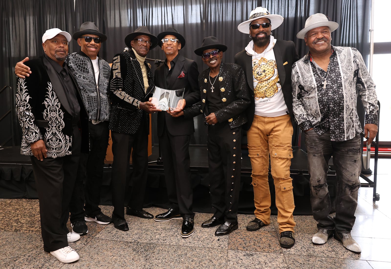 Members of The Original Lakeside pose during the 2025 Dayton Region Walk of Fame inductee luncheon, which was held Tuesday, Sept. 24 at Sinclair Community College. The Original Lakeside was inducted along with Rob Lowe, the Levin Family, Jenell Ross and Vic Cassano Sr. BRYANT BILLING / STAFF