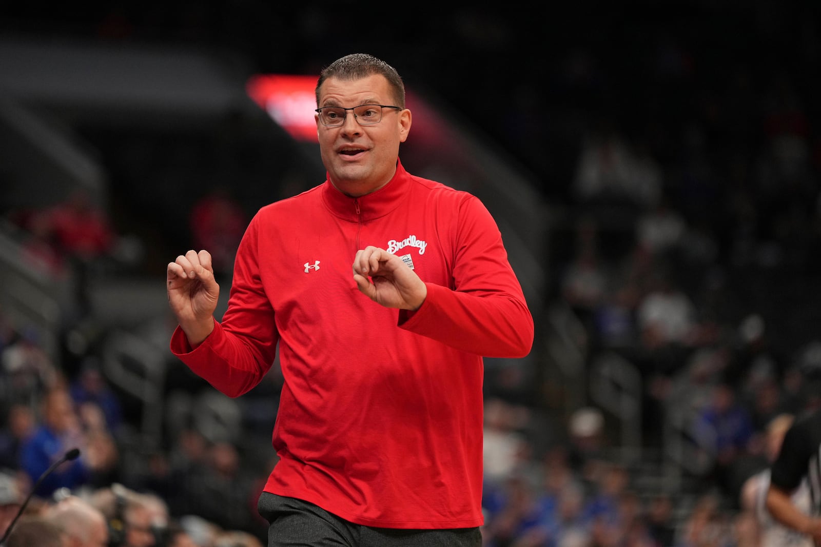 Bradley head coach Brian Wardle is seen on the sidelines during the first half of the championship game against Drake in the Missouri Valley Conference NCAA college basketball tournament Sunday, March 9, 2025, in St. Louis. (AP Photo/Jeff Roberson)