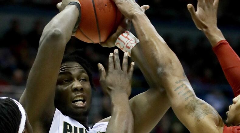 MILWAUKEE, WI - MARCH 18:  Caleb Swanigan #50 of the Purdue Boilermakers handles the ball while being guarded by Solomon Young #33 and Darrell Bowie #10 of the Iowa State Cyclones in the first half during the second round of the 2017 NCAA Tournament at BMO Harris Bradley Center on March 18, 2017 in Milwaukee, Wisconsin. (Photo by Jonthan Daniel/Getty Images)