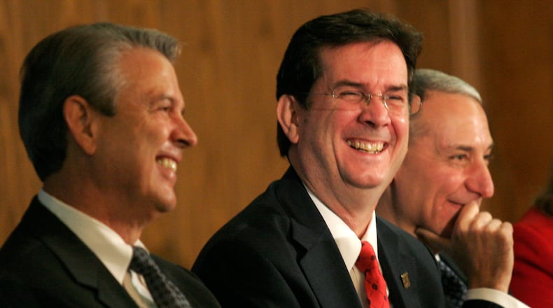 Former UD President Dan Curran, center, has been released from a hospital after a liver transplant. Also shown are Jack Proud, then-chair of the UD Board of Trustees, and Chancellor Eric Fingerhut of the Ohio Board of Regents. LISA POWELL / STAFF