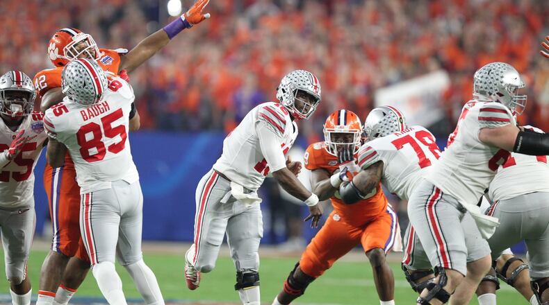 J.T. Barrett throws a pass against Clemson in the Fiesta Bowl on Dec. 31, 2016.