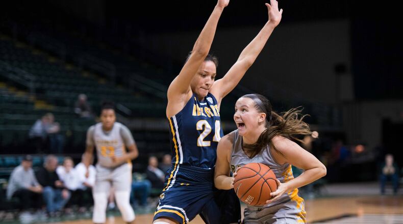 Wright State’s Mackenzie Taylor looks to drive past Kent State’s Alexa Golden during a game earlier this season. Taylor recently surpassed the 1,000-point mark for her career. Joseph Craven/CONTRIBUTED