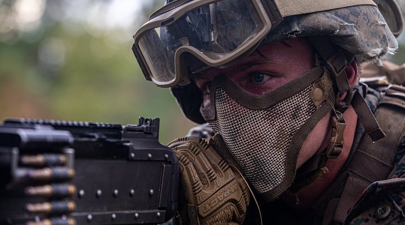 U.S. Marine Corps Lance Cpl. Levi Moell, a machine gunner with Bravo Company, 1st Battalion, 6th Marine Regiment, 2nd Marine Division, provides security on Nov. 11, 2020 at De Soto National Forest in Mississippi. JACQUELINE PARSONS/U.S. MARINE CORPS