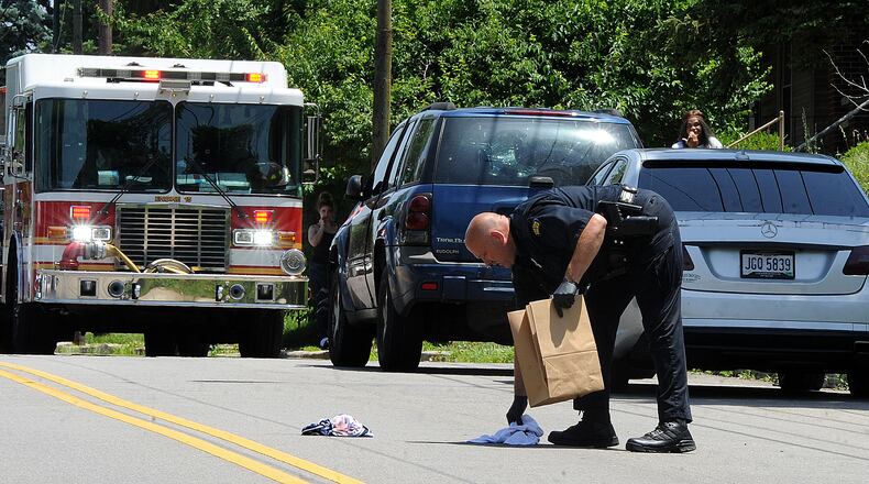 Dayton Police and medics were called to the 900 block of Wyoming Street Wednesday June 15, 2022 on reports of a person shot in the neck.
MARSHALL GORBY\STAFF