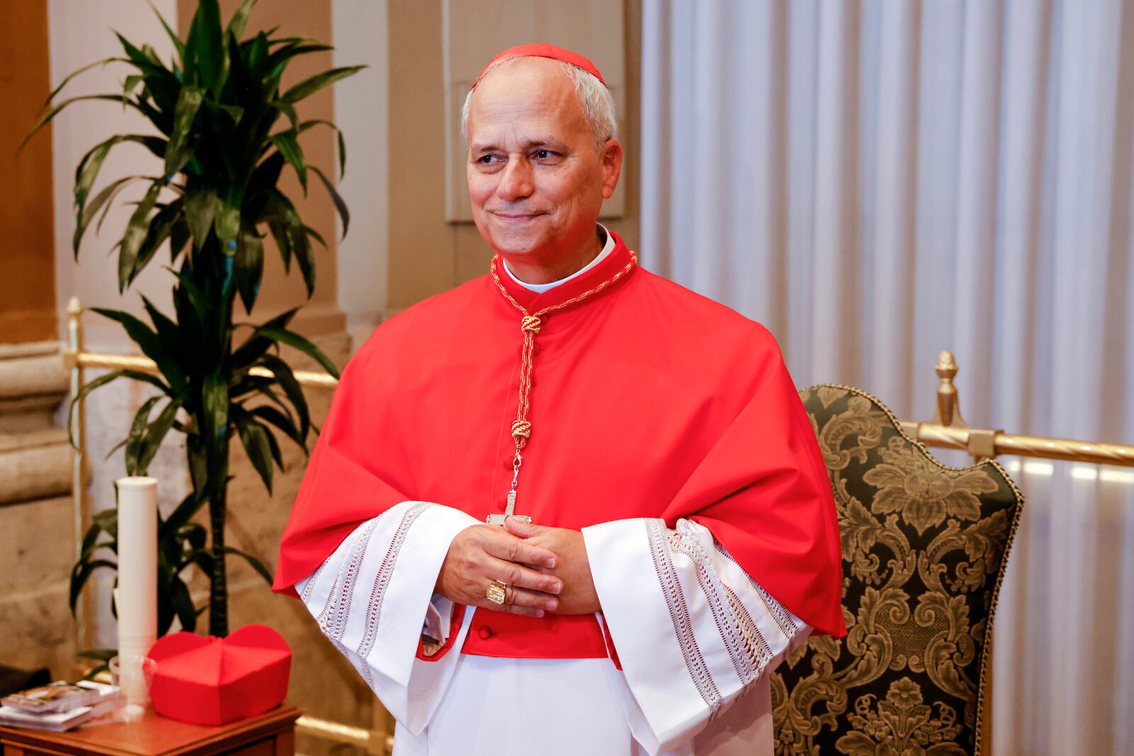FILE - New Cardinal Robert Francis Prevost, Prefect of the Dicastery for Bishops, poses for a photo at the end of the consistory where Pope Francis elevated 21 new cardinals in St. Peter's Square at the Vatican, Saturday, Sept. 30, 2023. (AP Photo/Riccardo De Luca, file)