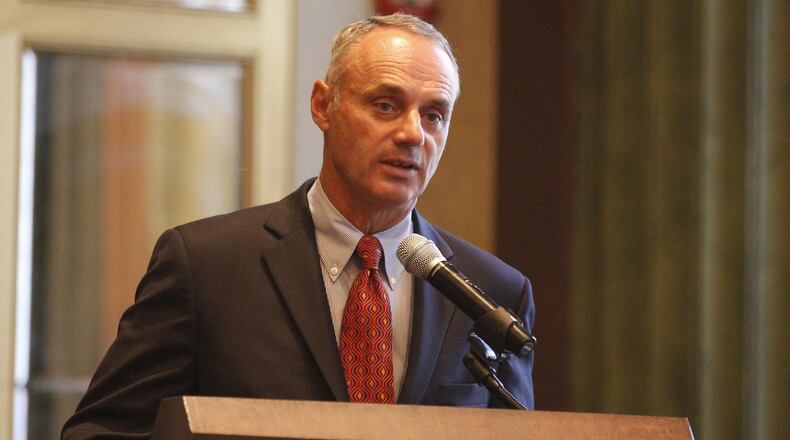 Major League Baseball Commissioner Rob Manfred speaks at a Baseball Writers Association of America meeting on Tuesday, July 14, 2015, at Cincinnati. David Jablonski/Staff