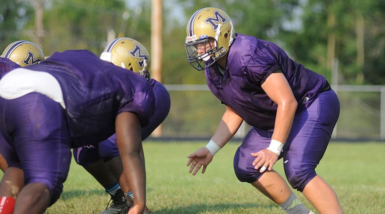 Junor Seirobi Sumlin (left) and senior two-way lineman Dillon Allen pack a hefty punch for the Thurgood Marshall High School football team.