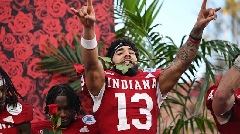 Indiana wide receiver Elijah Sarratt (13) celebrates after a win over Alabama in the Rose Bowl College Football Playoff quarterfinal game Thursday, Jan. 1, 2026, in Pasadena, Calif. (AP Photo/Kyusung Gong)