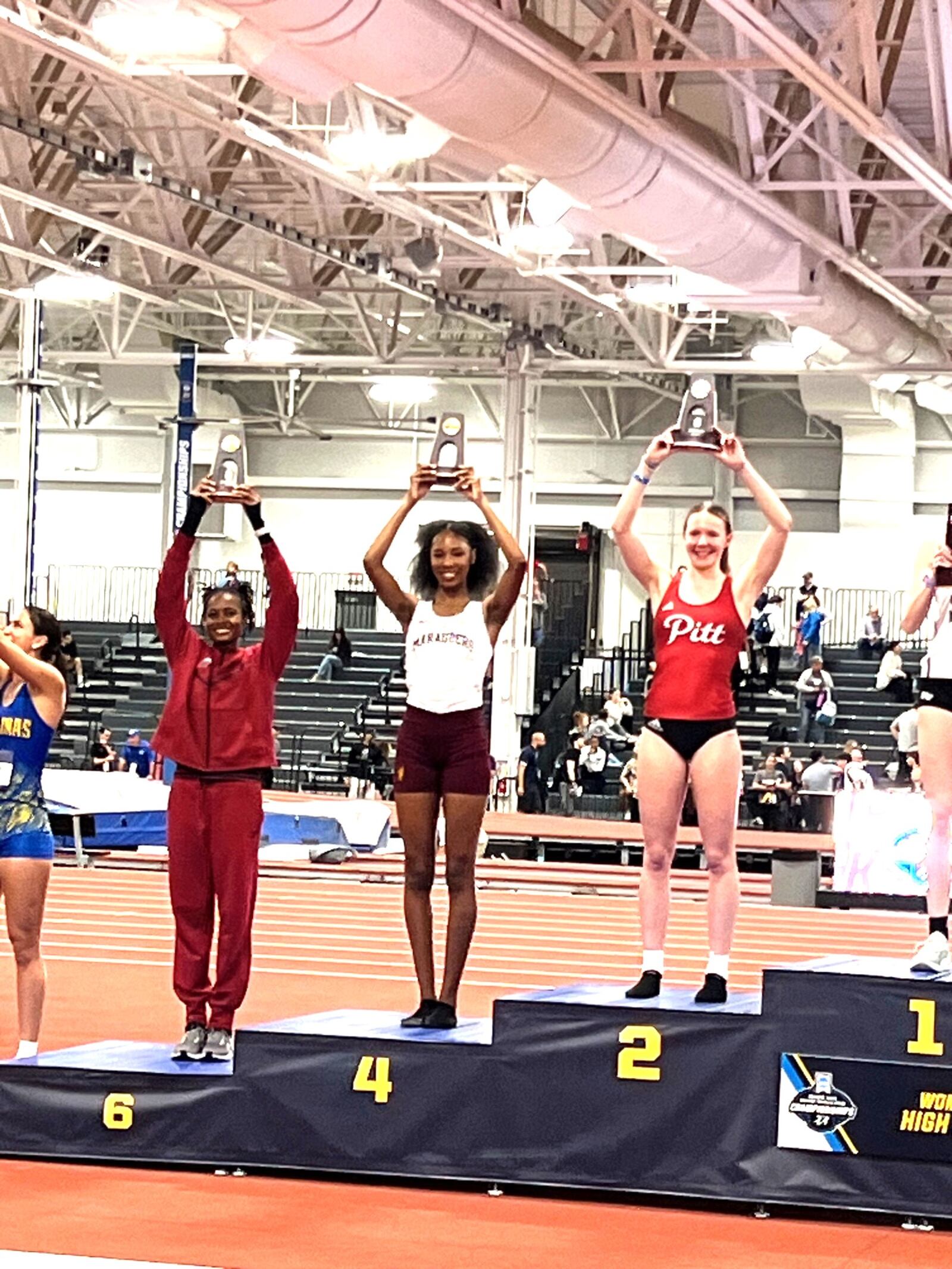 Central State high jumper Amarianna Lofton on the podium after finishing fourth at the NCAA Division II Indoor Track and Field Championships in Indianapolis last month. CONTRIBUTED PHOTO