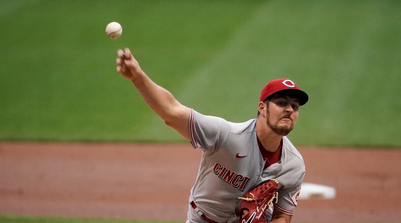 Cincinnati Reds starting pitcher Trevor Bauer throws during the first inning of a baseball game against the Milwaukee Brewers Friday, Aug. 7, 2020, in Milwaukee. (AP Photo/Morry Gash)