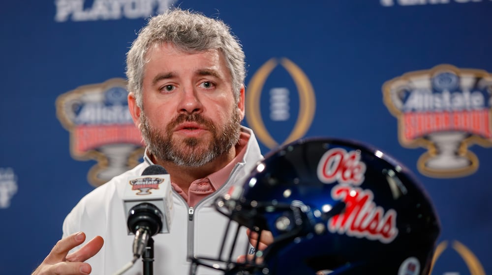 Ole Miss head coach Pete Folding talks with reporters during the Sugar Bowl Media Day in New Orleans, Tuesday, Dec. 30, 2025. (David Grunfeld /The Times-Picayune/The New Orleans Advocate via AP)