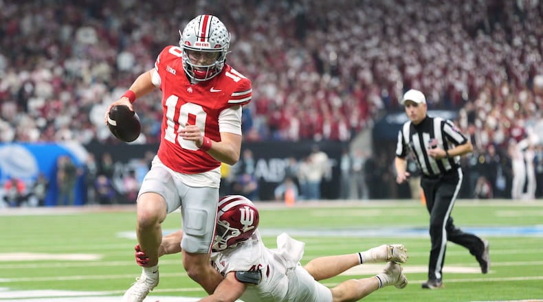 Indiana's Isaiah Jones stops Ohio State's Julian Sayin during the first half of the Big Ten championship NCAA college football game in Indianapolis, Saturday, Dec. 6, 2025. (AP Photo/AJ Mast)