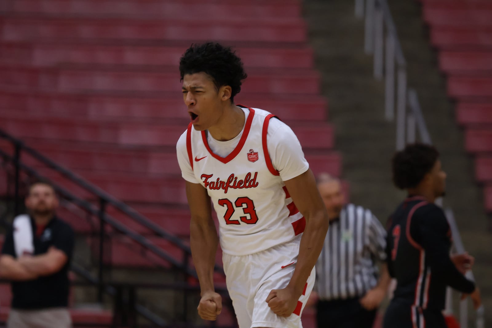 Fairfield sophomore Kaiden Jones celebrates a dunk against Lakota West on Tuesday night at Fairfield Arena. ELIJAH COOK / CONTRIBUTED