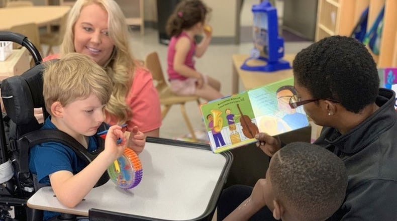 Four-year-old Asher Cain benefits from programs provided by United Rehabilitation Services. CONTRIBUTED