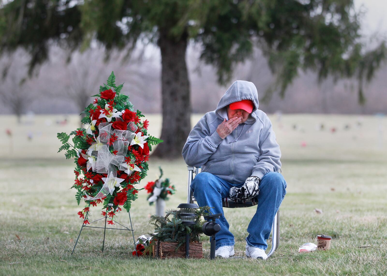 This image of Carolyn Friend at the grave of her partner Barbara Collins was among the photographs entered by Dayton Daily News reporter Chris Stewart, named a finalist in the Best Photographer category in the Associated Press Media Editor's 2016 newspaper contest."I kiss my hand and put it on the stone and then I kiss it again and tell her I love her more," said Friend of Moraine while visiting the grave of her partner of more than 50 years. Collins died in 2013 before the Obergefell v. Hodges Supreme Court decision legalized gay marriage in all states -- including Ohio, which was one of the last holdouts. Friend may yet lose the house the two shared because of paperwork snafus and the inability to receive survivor benefits.Stewart is also a finalist in the Best Explanatory Reporting and Best Enterprise Reporting categories of the contest. CHRIS STEWART / STAFF