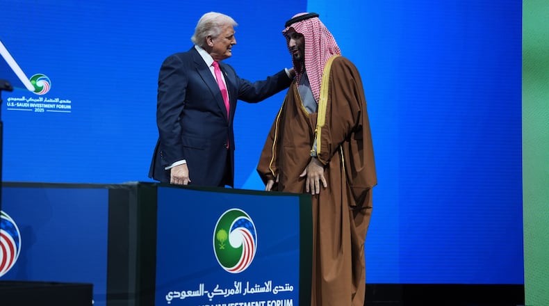President Donald Trump speaks with Saudi Arabia's Crown Prince Mohammed bin Salman during the Saudi Investment Forum at the Kennedy Center, Wednesday, Nov. 19, 2025, in Washington. (AP Photo/Evan Vucci)