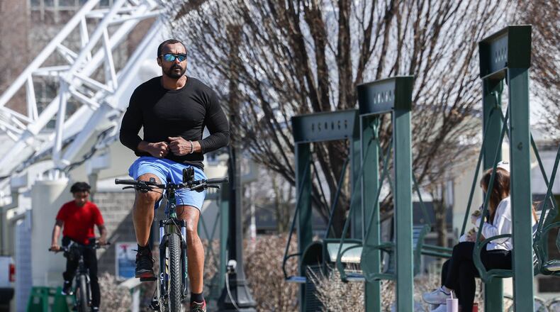 Biclysists ride through RiverScape Metropark on Monday afternoon. BRYANT BILLING / STAFF