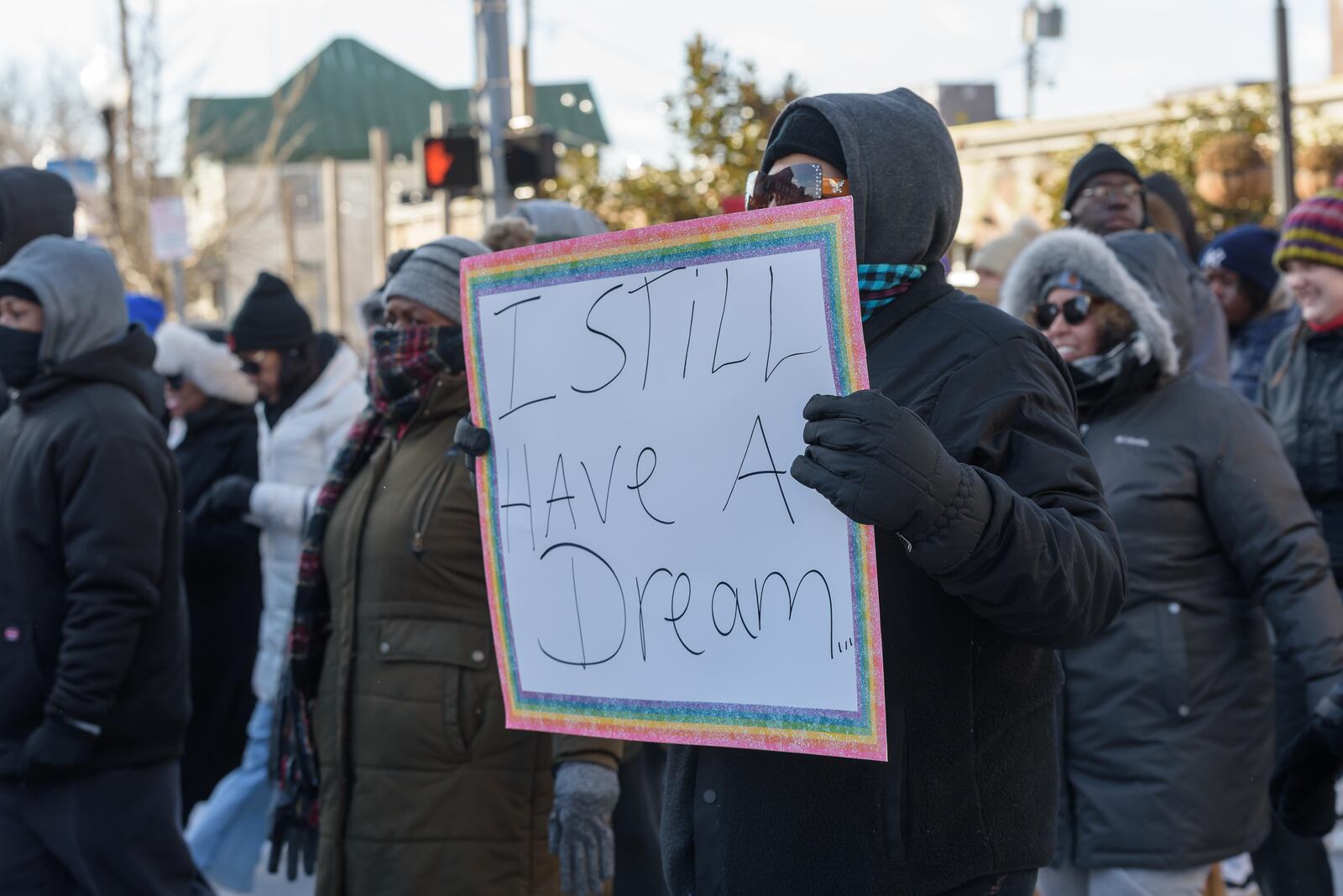Daytonians gathered to honor Rev. Dr. Martin Luther King Jr. at the annual MLK Day Memorial March on Monday, Jan. 19, 2026. The march started at the Drew Health Center on W. Third St. through the Wright Dunbar Business District over the Dayton Peace Bridge and concluded at Sinclair Community College. TOM GILLIAM / CONTRIBUTING PHOTOGRAPHER