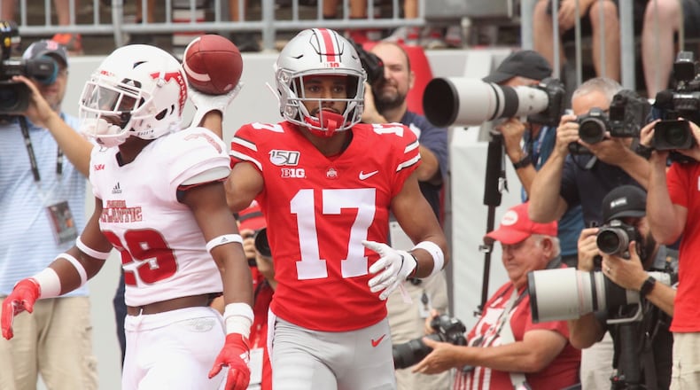 Chris Olave reacts after scoring a touchdown against Florida Atlantic in the 2019 season opener at Ohio Stadium. David Jablonski/Staff