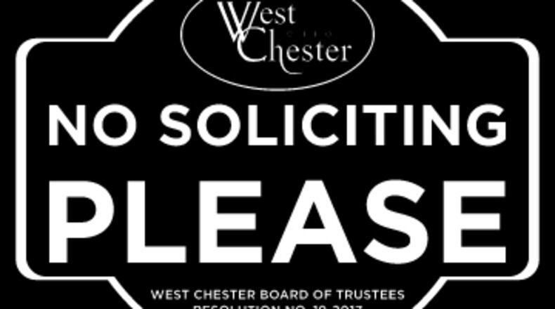 West Chester Twp. has passed new restrictions on door-to-door vendors and is offering free decals alerting solicitors not to knock.