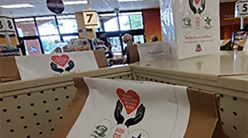 Pictured is a Feds Feed Families display of pre-packaged donation bags at the Fort Lee, Virginia, Commissary. CONTRIBUTED PHOTO/DEFENSE COMMISSARY AGENCY