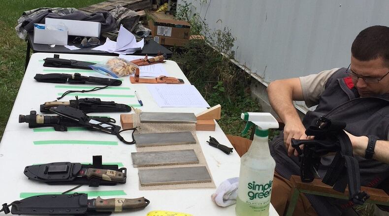 WRIGHT-PATTERSON AIR FORCE BASE – 2nd Lt. Brent Young, Air Force Research Laboratory researcher and member of the Ejection Seat Survival Kit Enhancement, Modernization and Optimization team, tests a new and improved knife for the kit. Testing and consensus from the 22nd Training Squadron and 336th Training Group will be determined and then recommended to the Air Force for inclusion in the survival kit. (U.S. Air Force photo/Capt. Jason Goins)