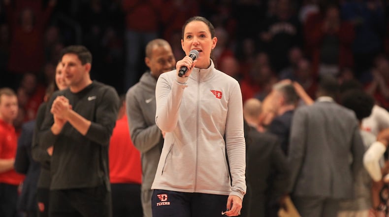 Dayton women's basketball coach Shauna Green speaks to the crowd at UD Arena during a Dayton men's basketball game on Feb. 8, 2020. David Jablonski/Staff