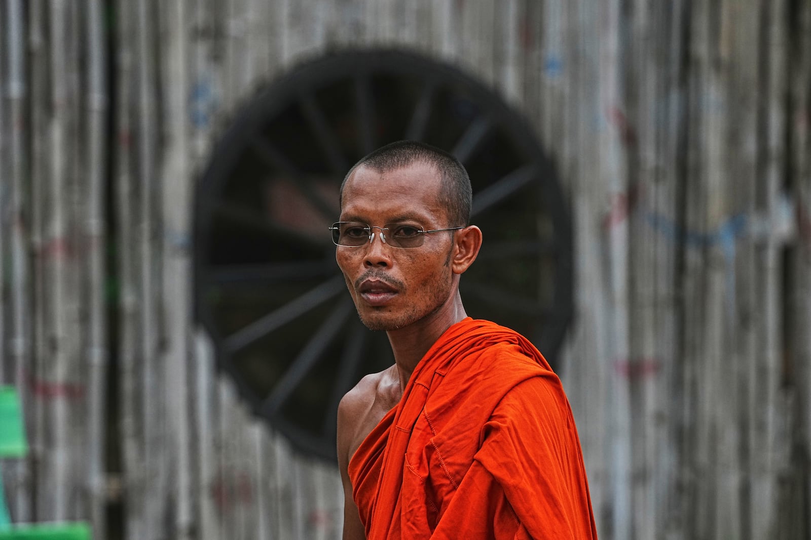 Cambodian Buddhist chief monk, Tho Thoross stands during an interview with The Associated Press at the Wat Prasat Samrong Pagoda in Oddar Meanchey province, Cambodia, Saturday, July 26, 2025, during fighting between Thailand and Cambodia. (AP Photo/Heng Sinith)