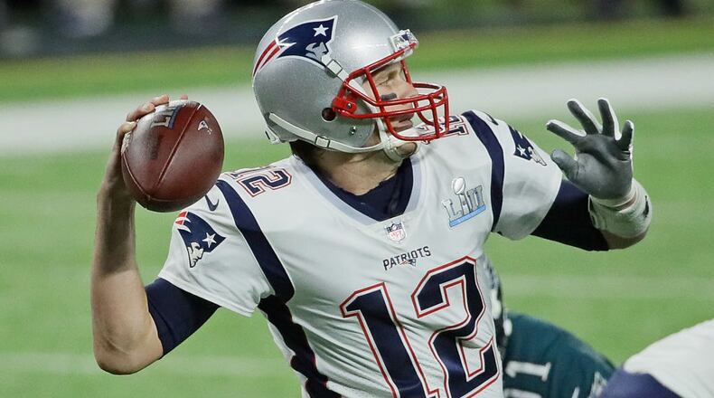 MINNEAPOLIS, MN - FEBRUARY 04: Tom Brady #12 of the New England Patriots passes against the Philadelphia Eagles during Super Bowl Lll at U.S. Bank Stadium on February 4, 2018 in Minneapolis, Minnesota. The Eagles defeated the Patriots 41-33. (Photo by Jonathan Daniel/Getty Images)
