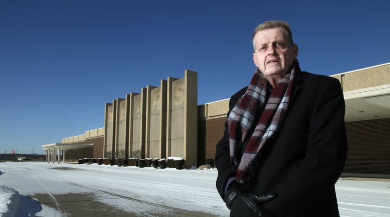 Larry Kroger, a long time resident of Trotwood and a retired security director, stands near the Sears store that closed earlier this month. ARTICLE: Once a retail hub, Trotwood struggles to compete